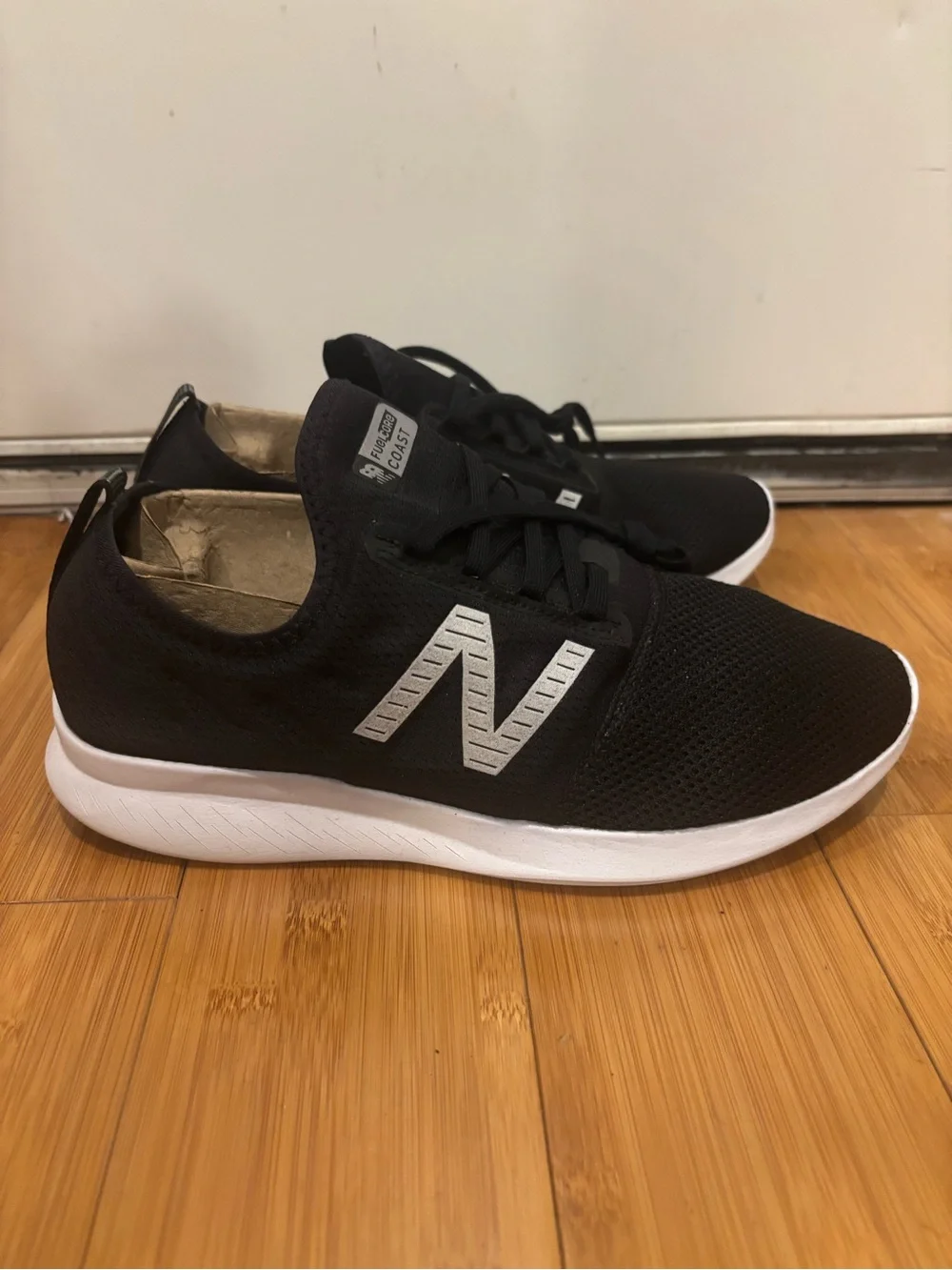 New Balance Black Sneakers with White Sole